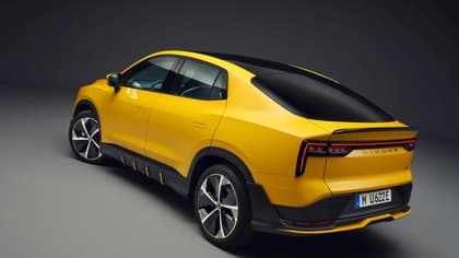 a yellow car with black trim