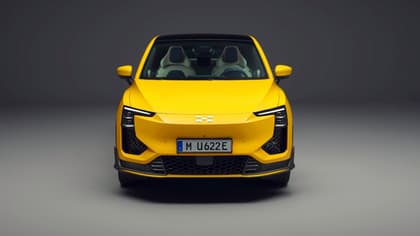 a yellow car with a black background