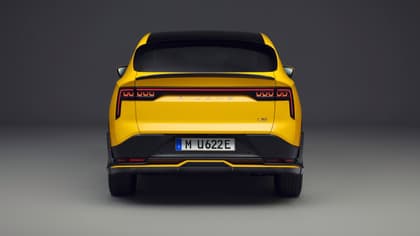the back of a yellow car