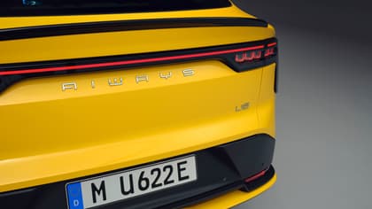 the back of a yellow car