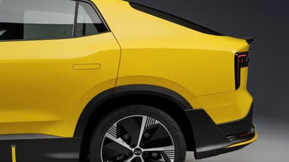 the back of a yellow car