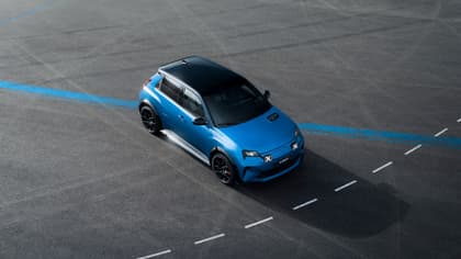 a blue car on a road