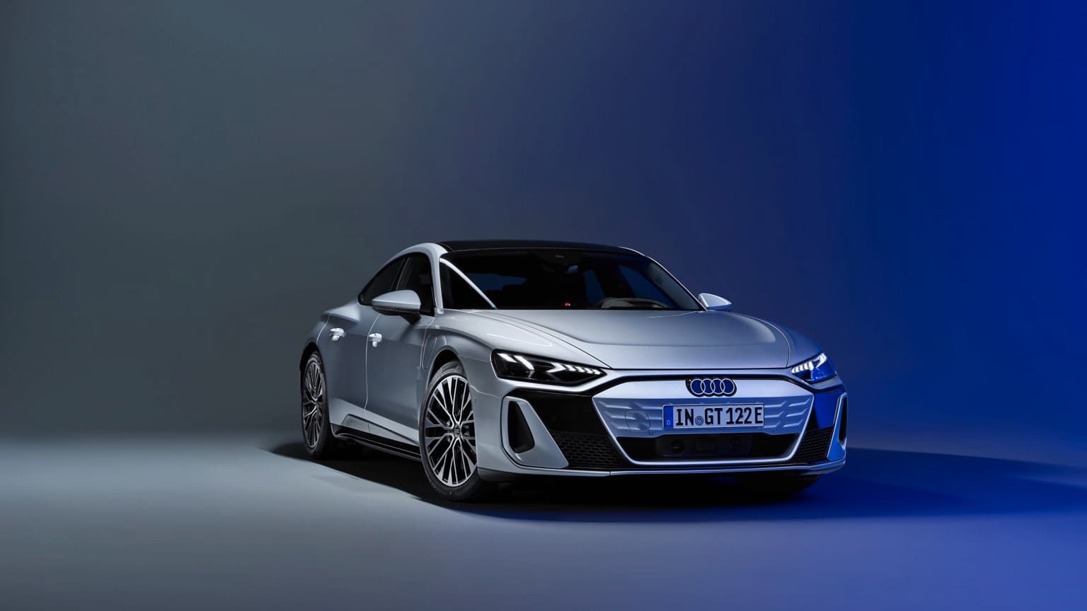 a silver car with blue lights