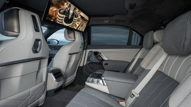 the inside of a car with a television