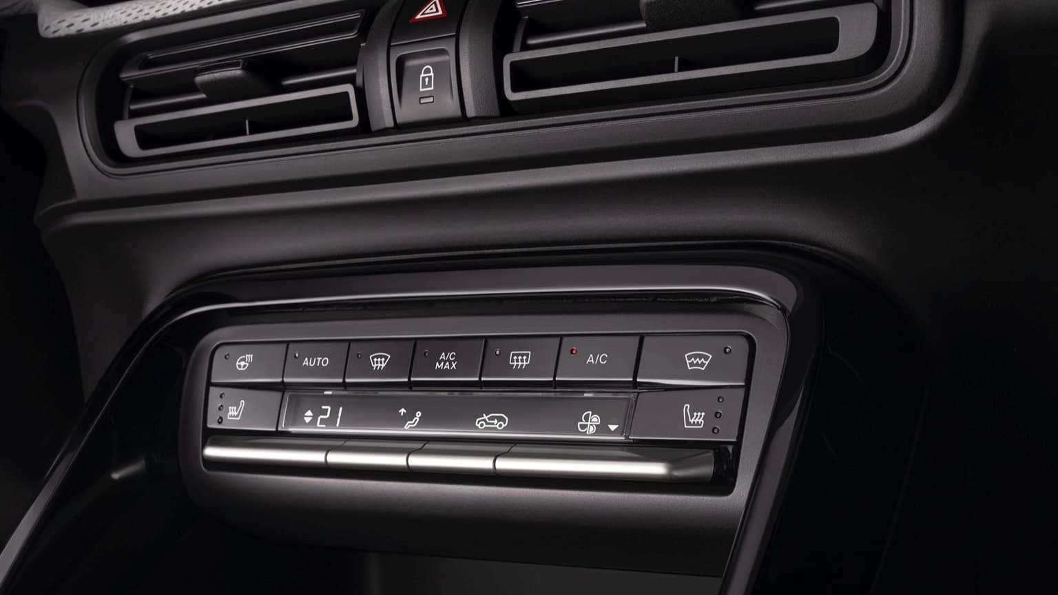 a close up of a car air conditioning panel