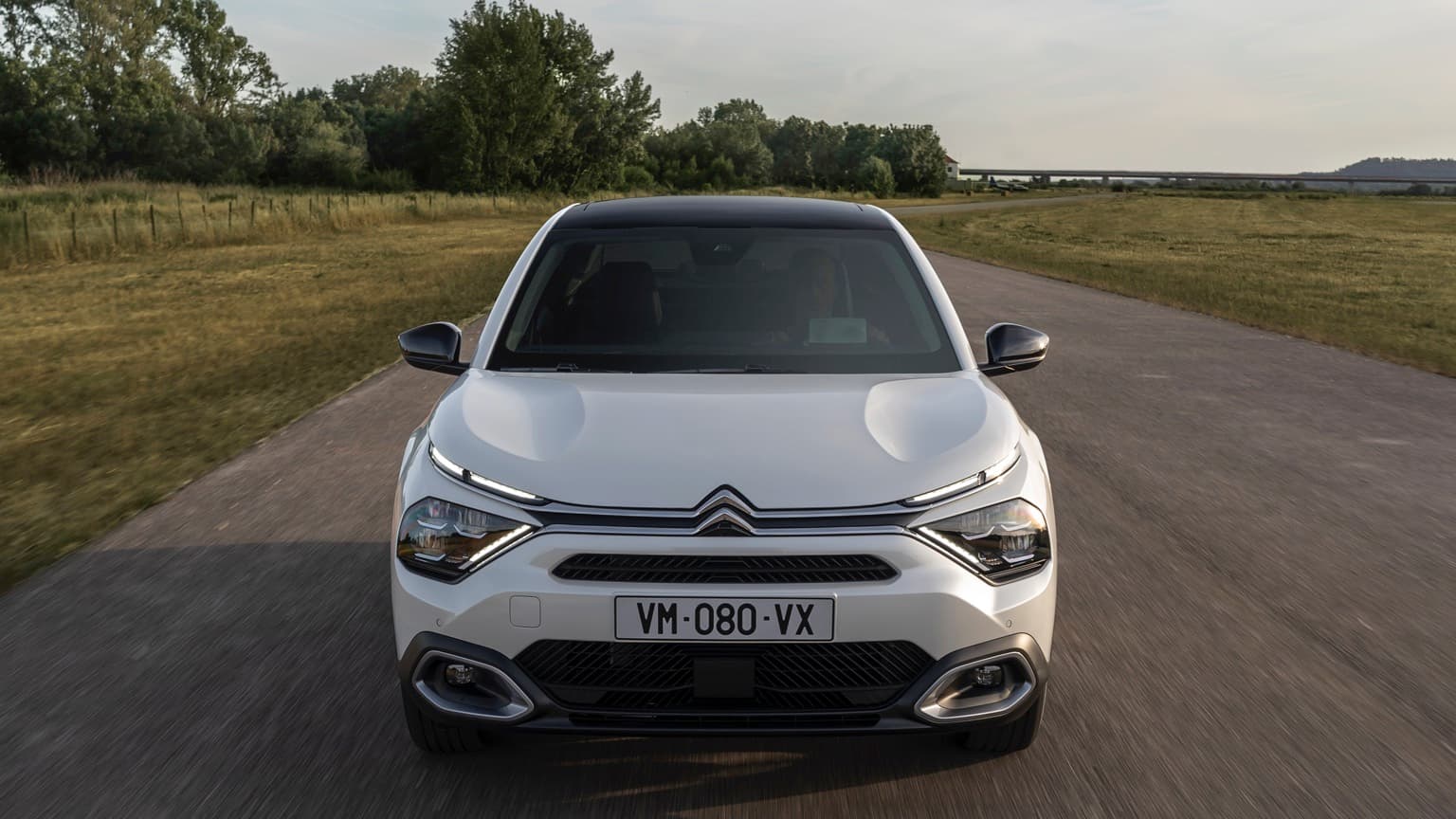 a white car on a road