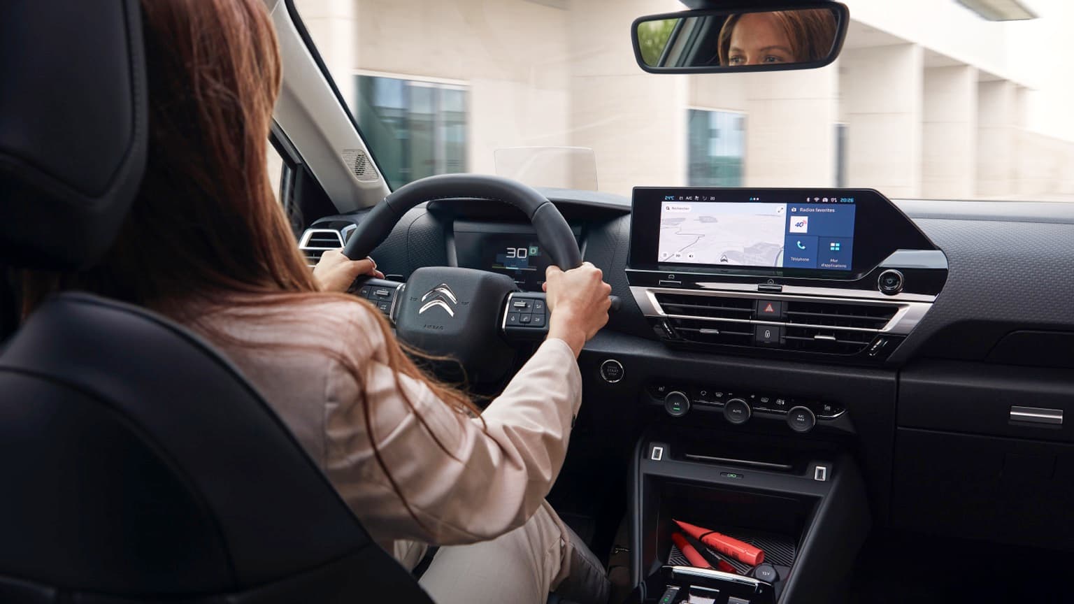 a woman driving a car
