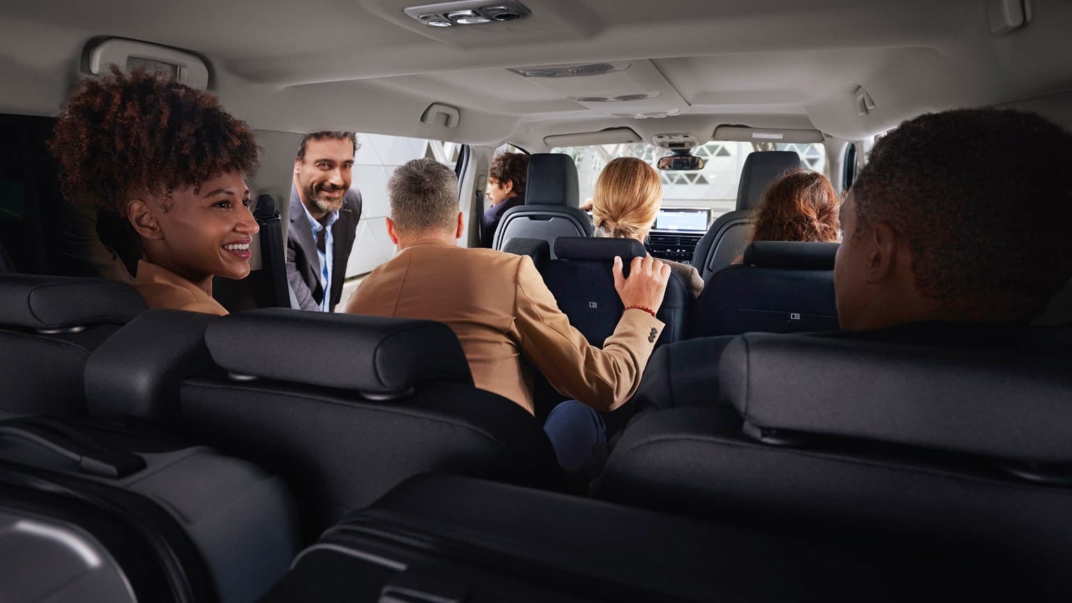 a group of people in a car