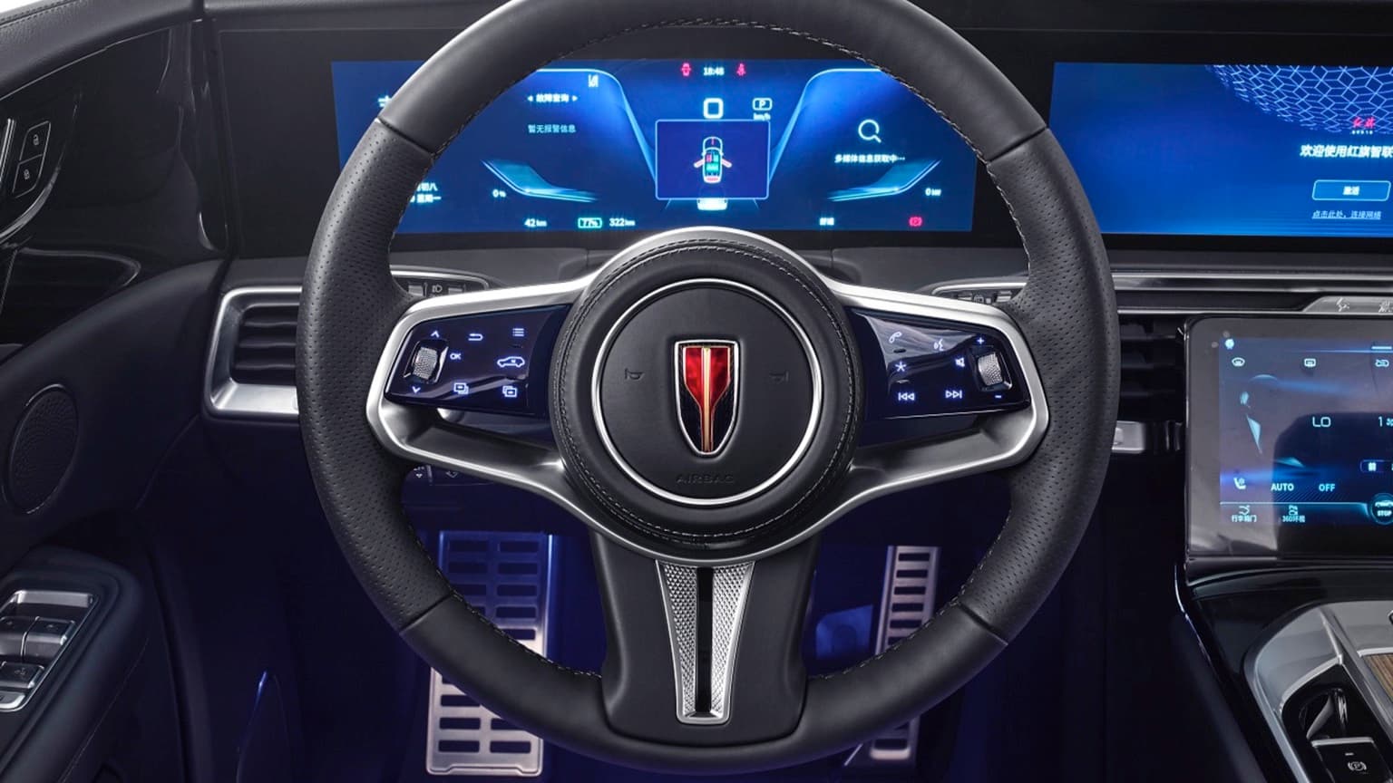 the steering wheel and dashboard of a car