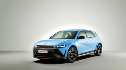 a blue car with black trim