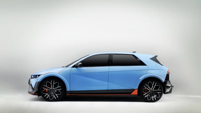 a blue car with black trim