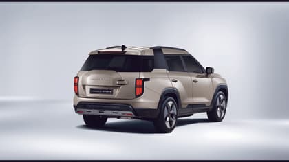 a silver suv with black trim