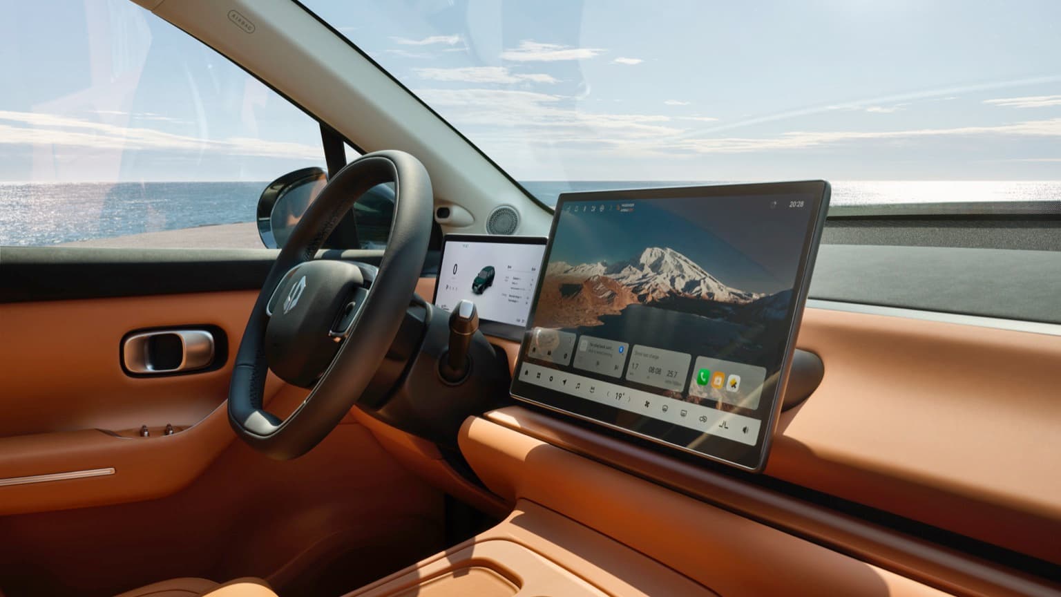 a car with a computer and steering wheel