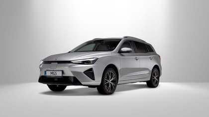 a silver car with black wheels