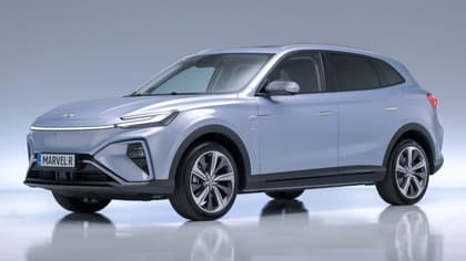 a silver suv parked on a white surface
