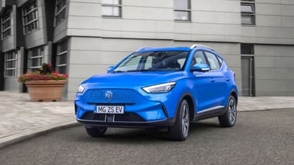 a blue car on the street