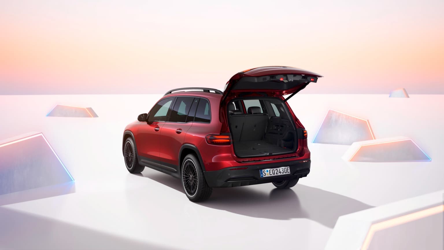 a red car with the trunk open