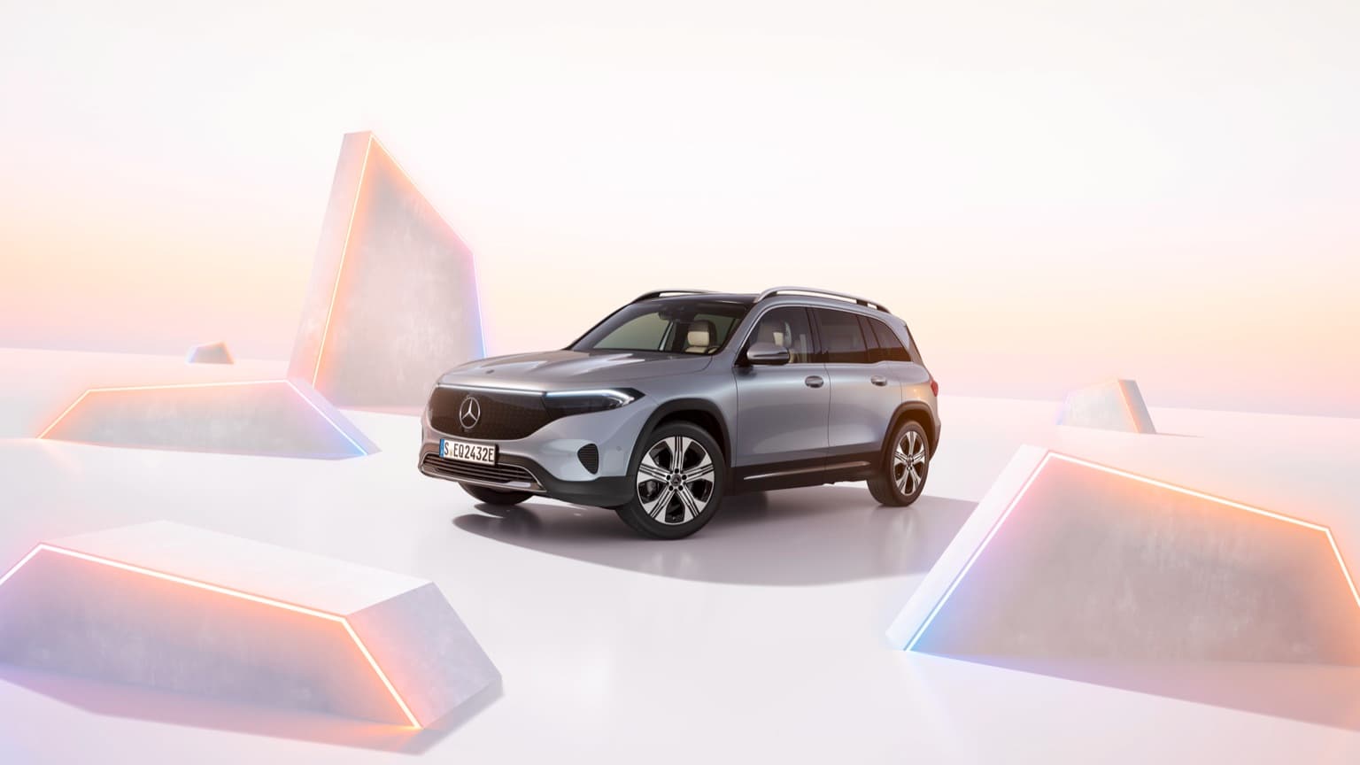 a car parked in a room with geometric shapes