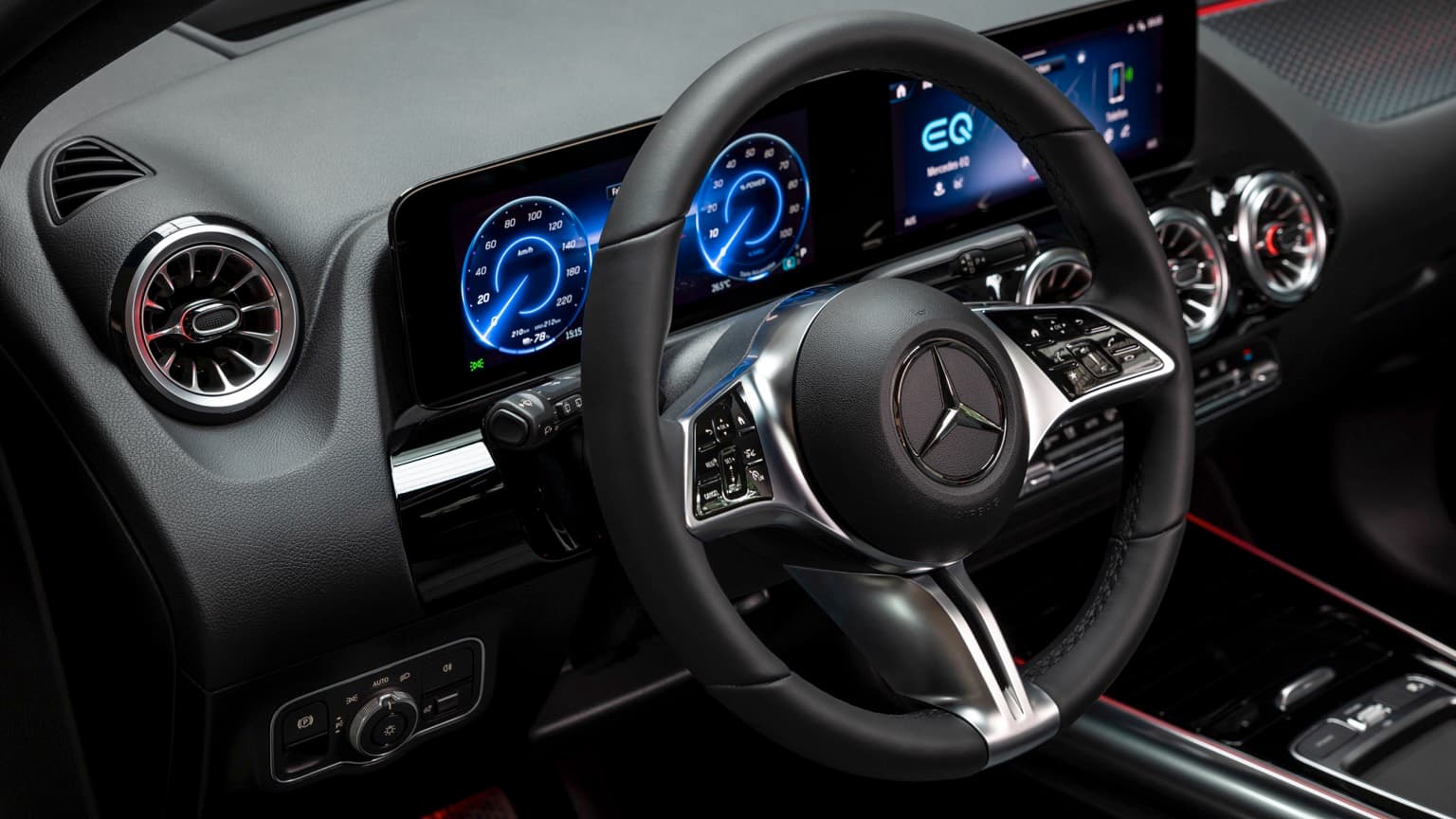 the steering wheel and dashboard of a car