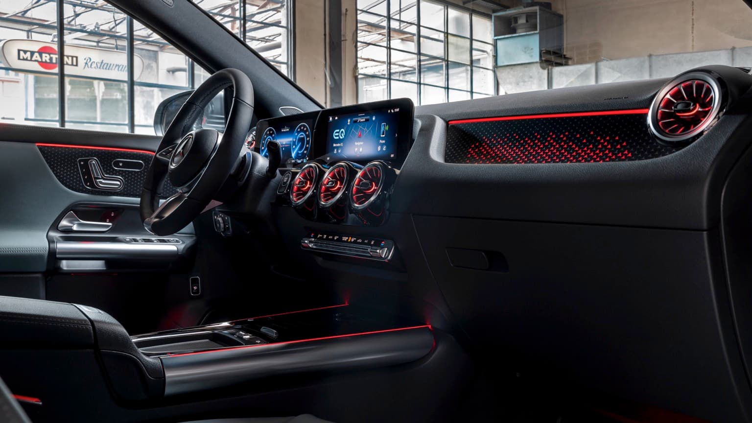 inside a car with a dashboard and steering wheel
