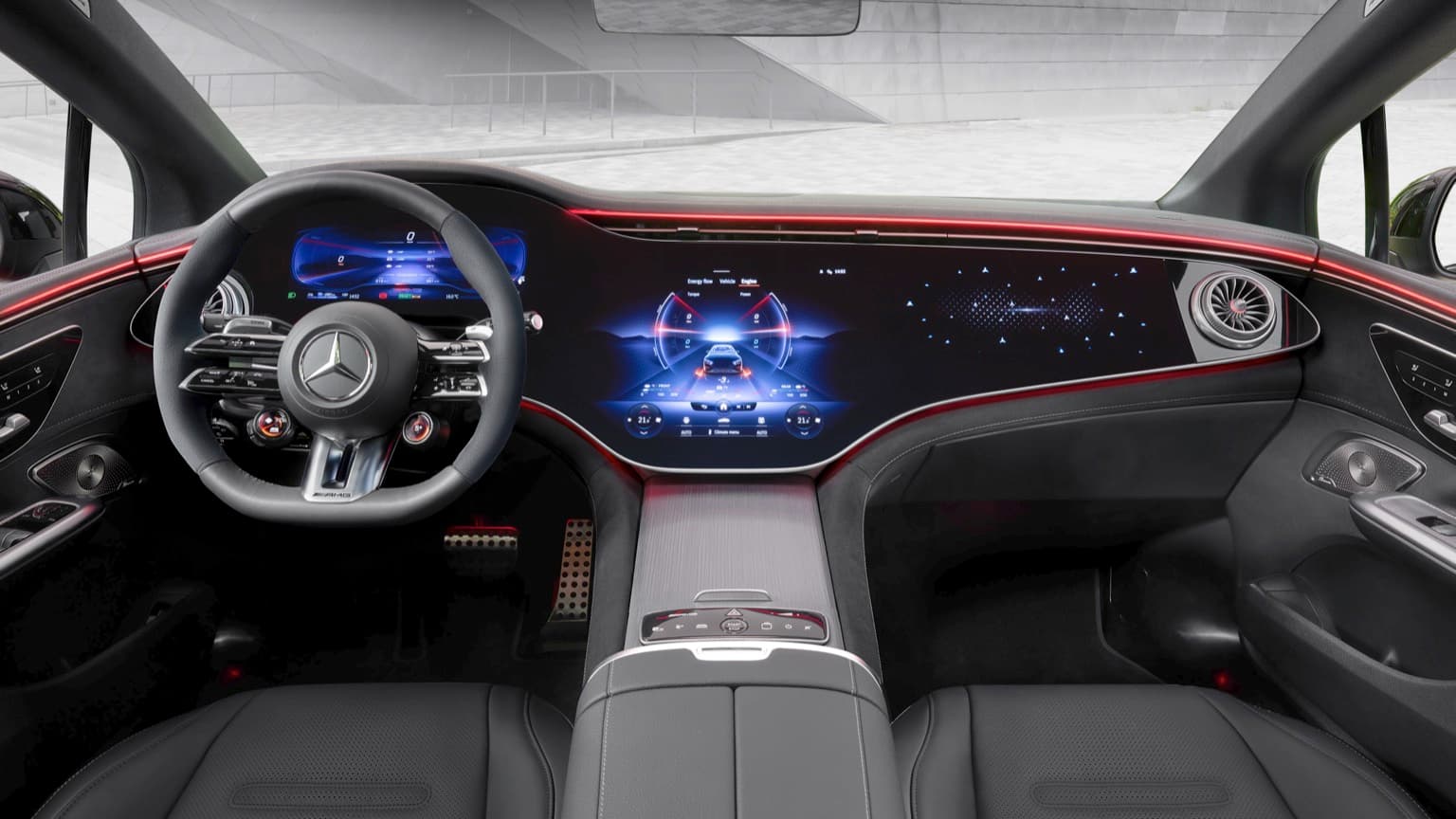 l'intérieur d'une voiture avec un volant et un tableau de bord