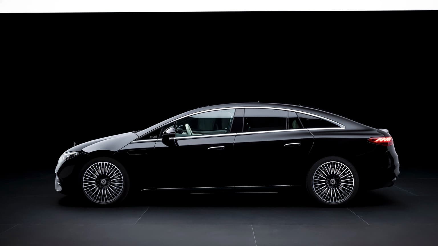 a black car with a black background