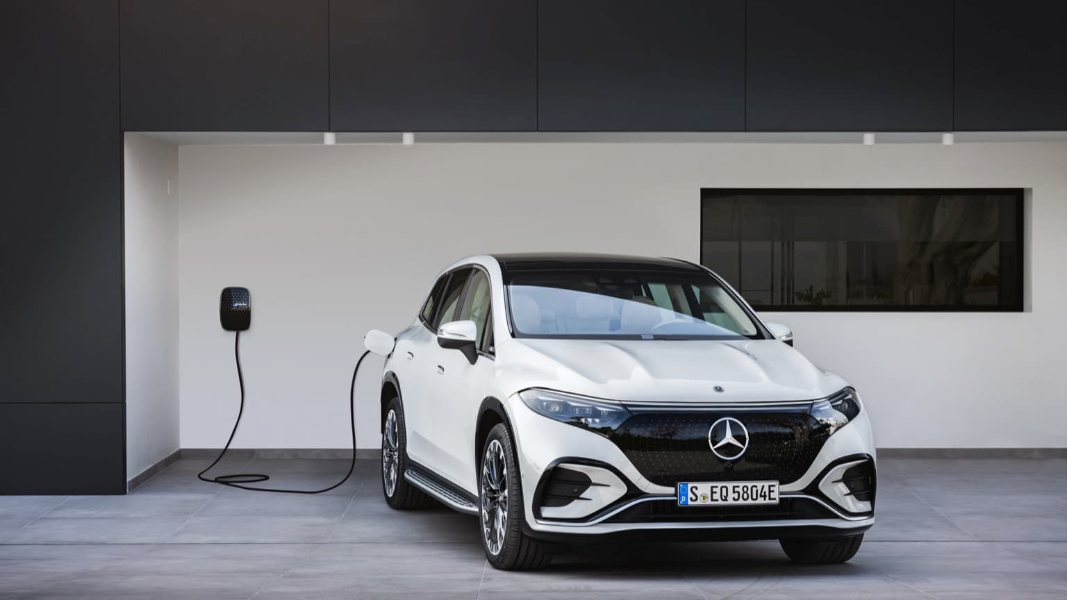 a white car parked in a garage