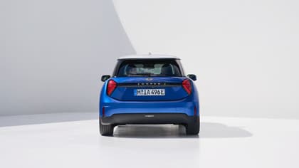 a blue car parked in a room