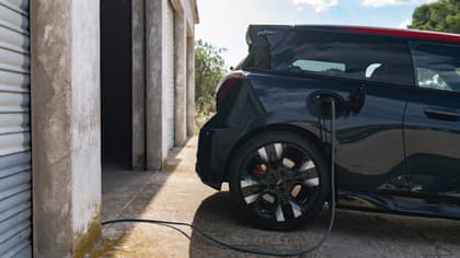 a car charging at a garage