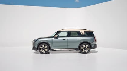 a car parked in a white room