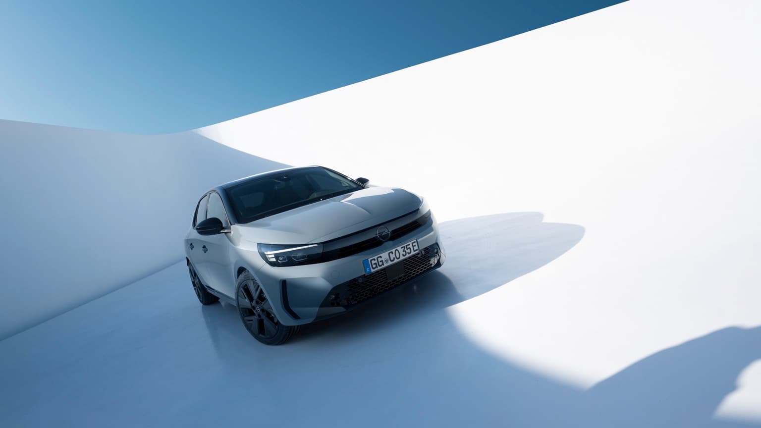 a car parked on a white surface