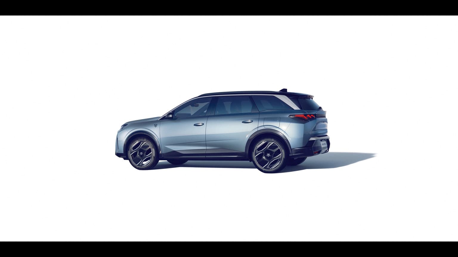 a blue car with black wheels