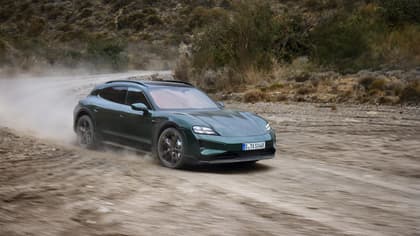 a car driving on a dirt road