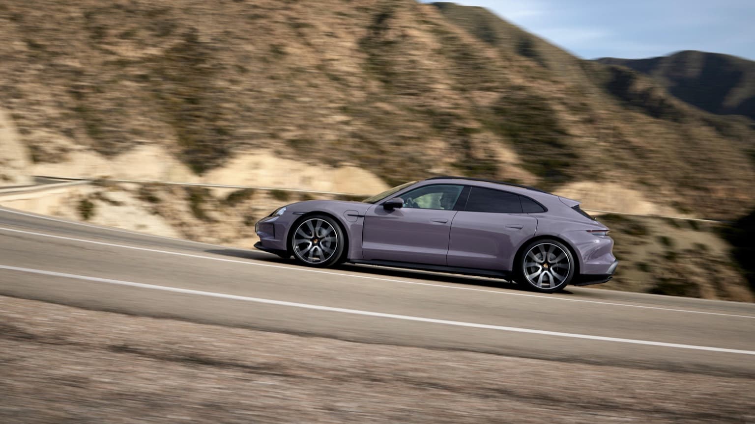 a purple car on a road