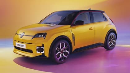 a yellow car with black trim