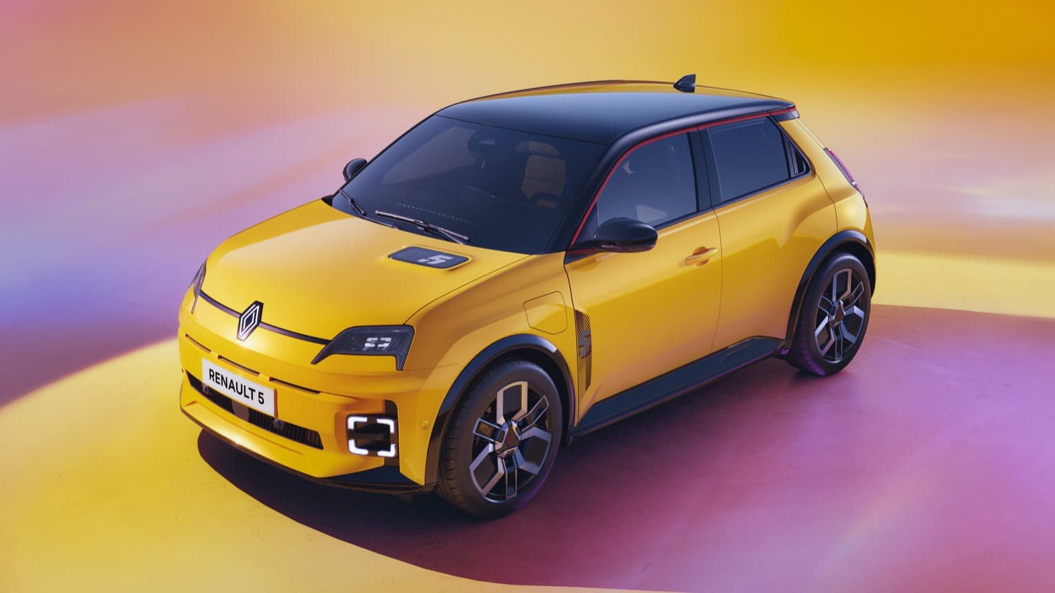 une voiture jaune avec des garnitures noires