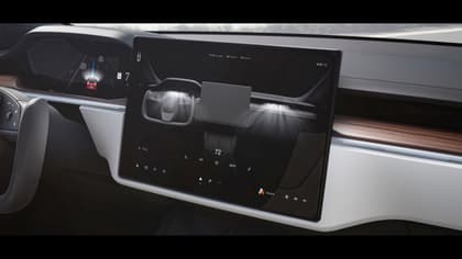 a screen on the dashboard of a car