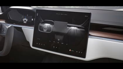 a screen on the dashboard of a car