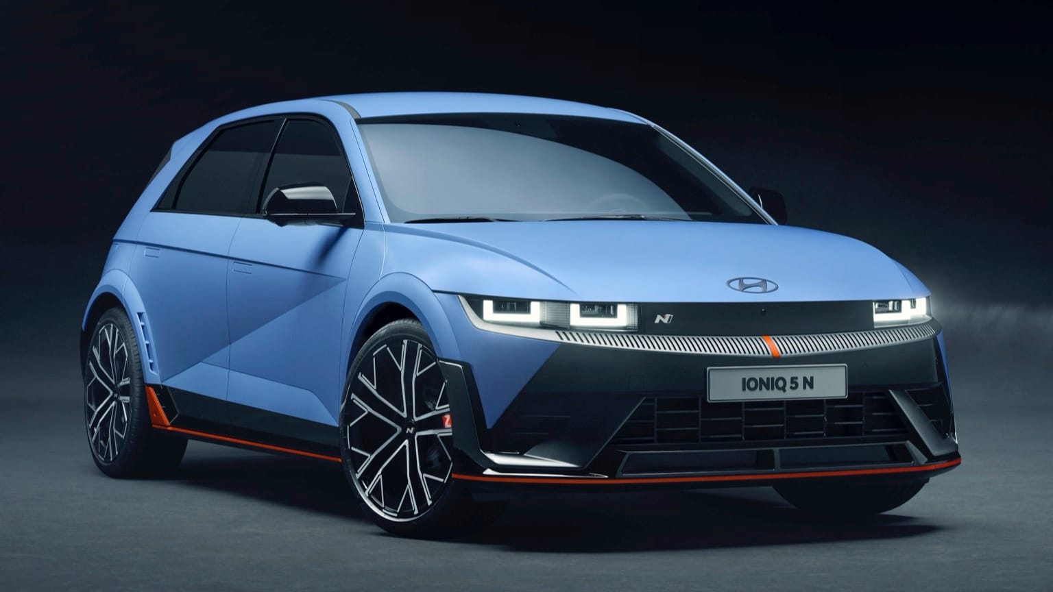 a blue car with black trim