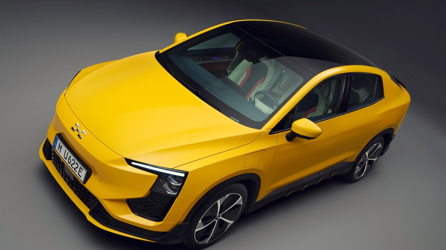 a yellow car with black trim
