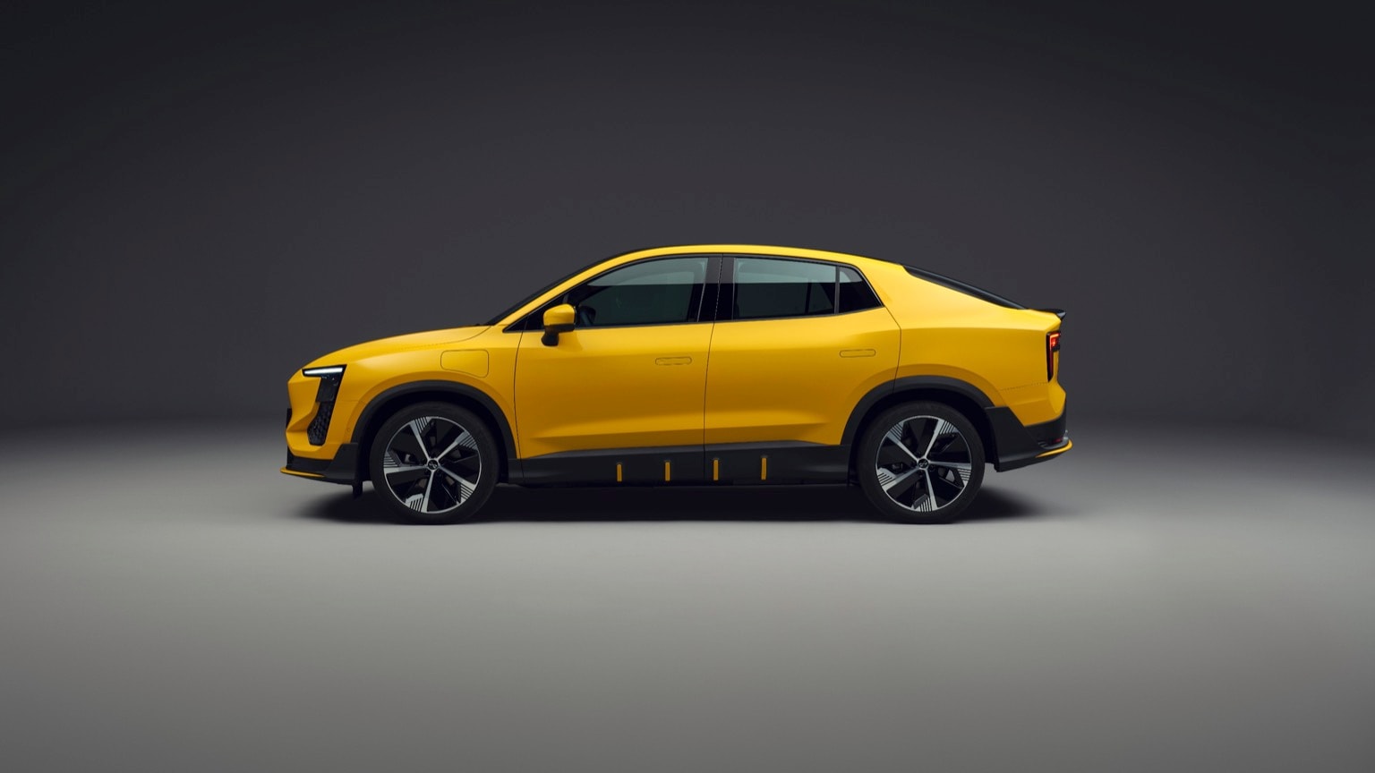 a yellow car with black trim