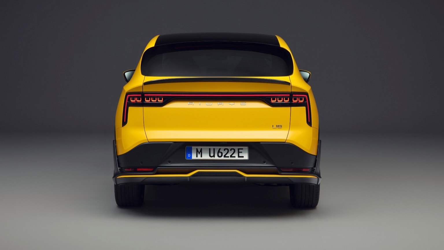 the back of a yellow car
