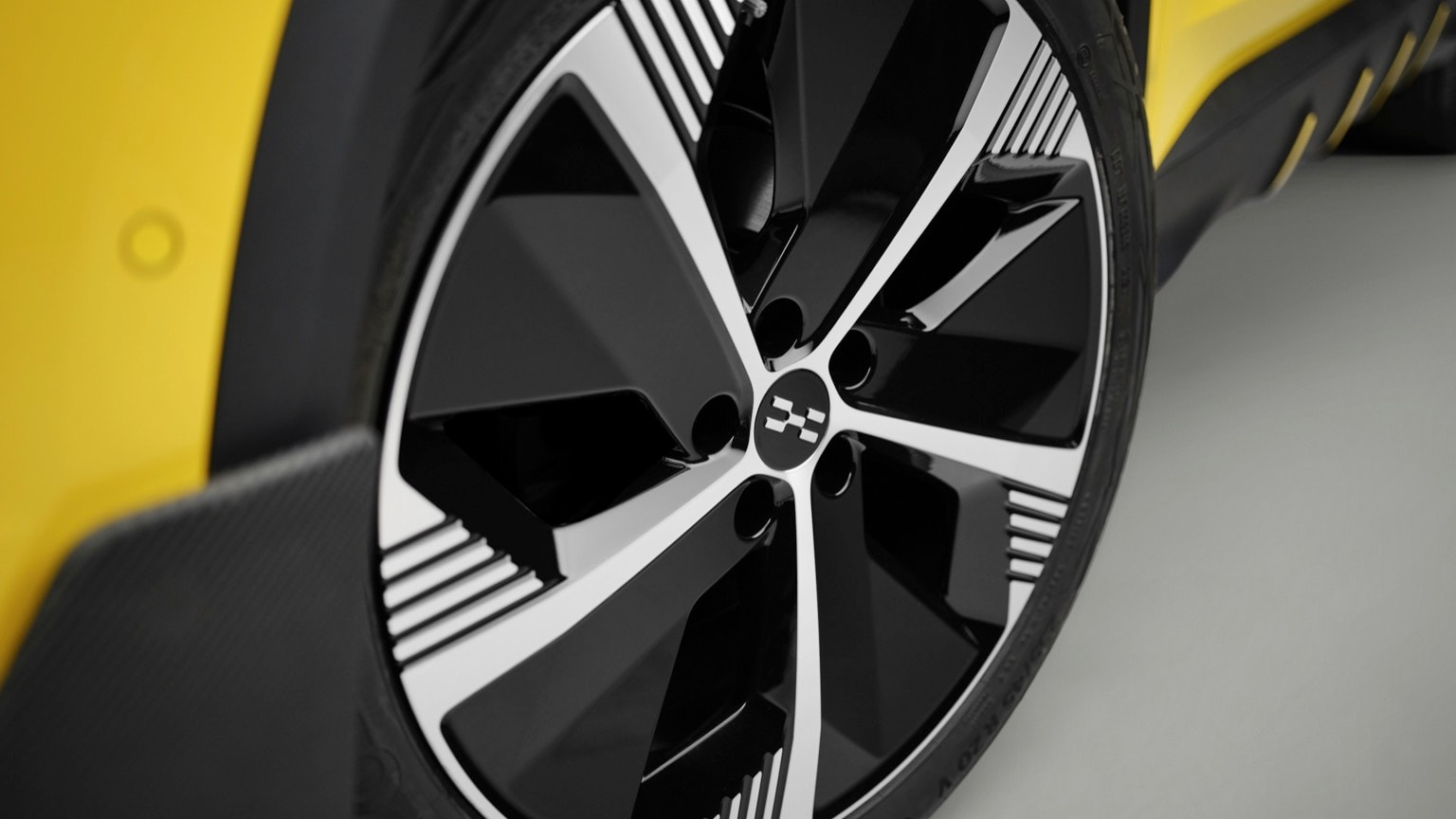 close up of a black and silver rim