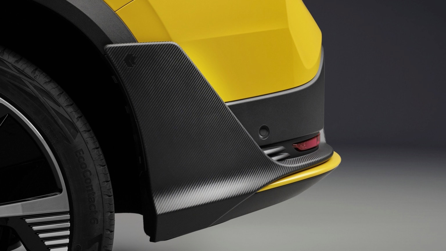 the side of a yellow car