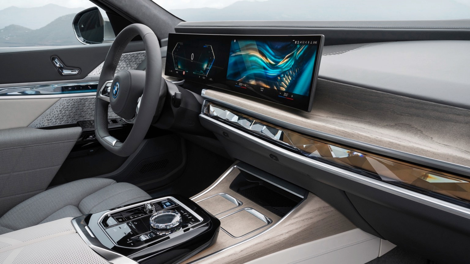 a car with a screen and a steering wheel