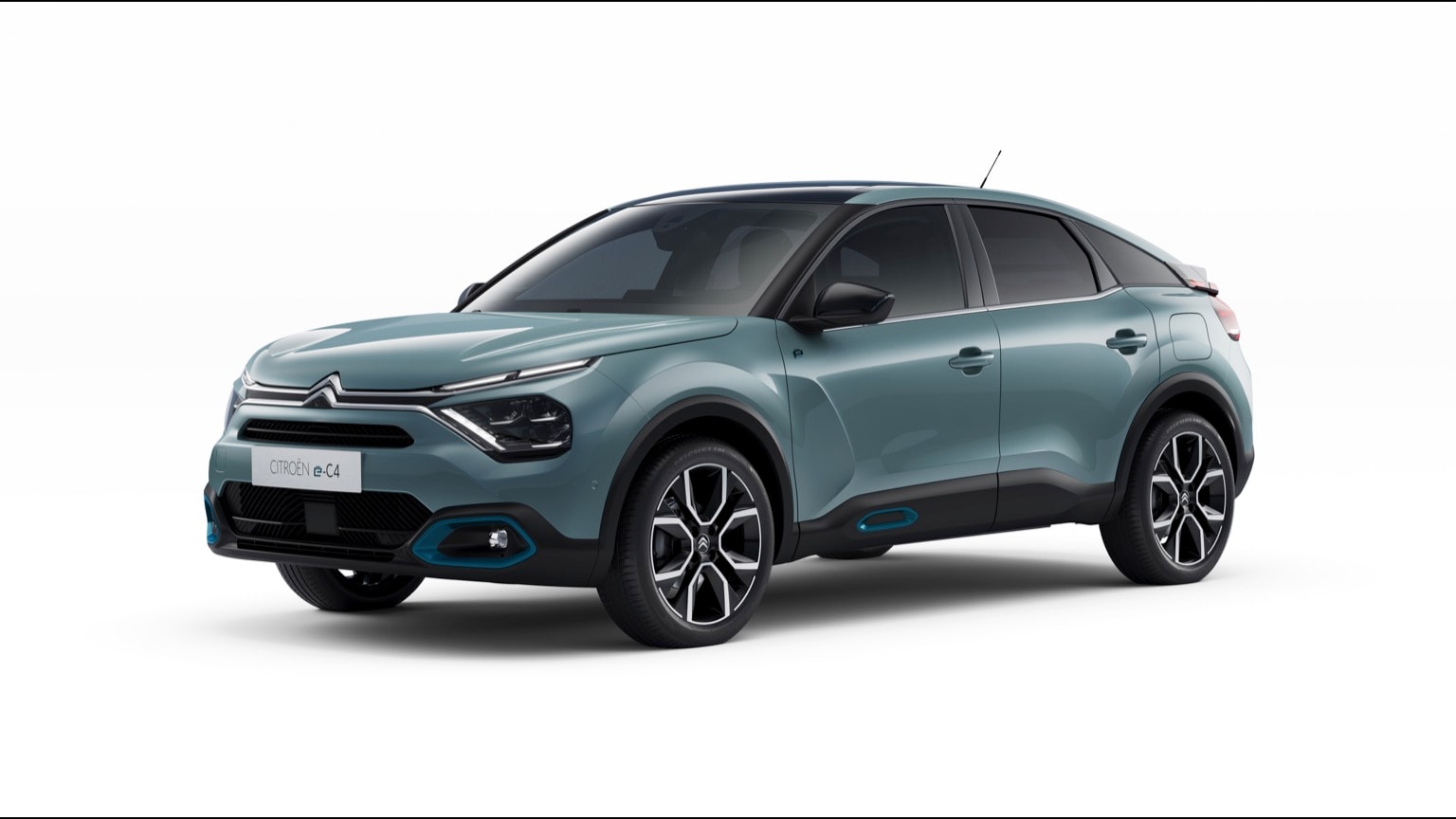 une voiture bleue avec des garnitures noires avec l'Arboretum de Holden en arrière-plan