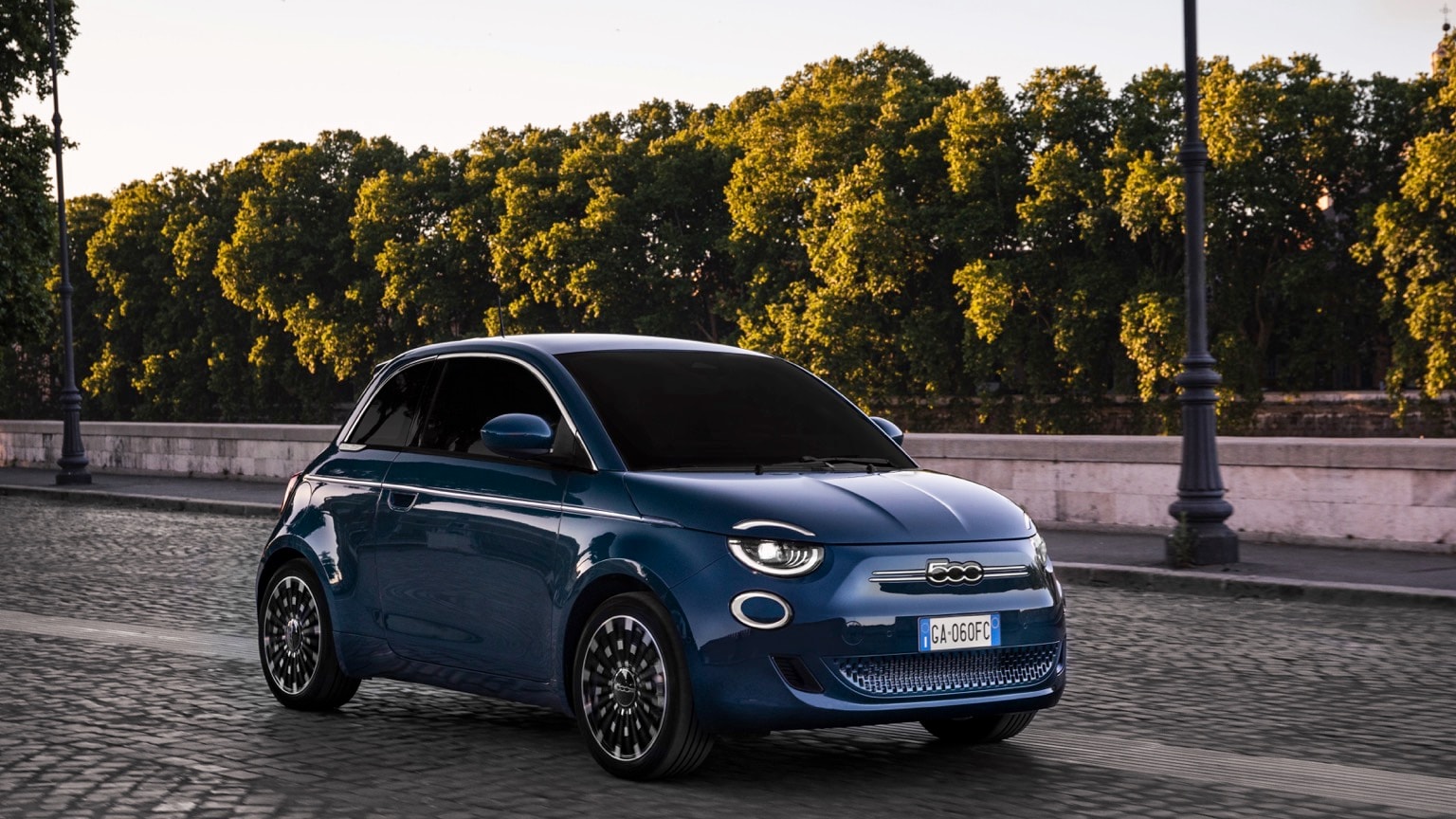 a blue car on a road