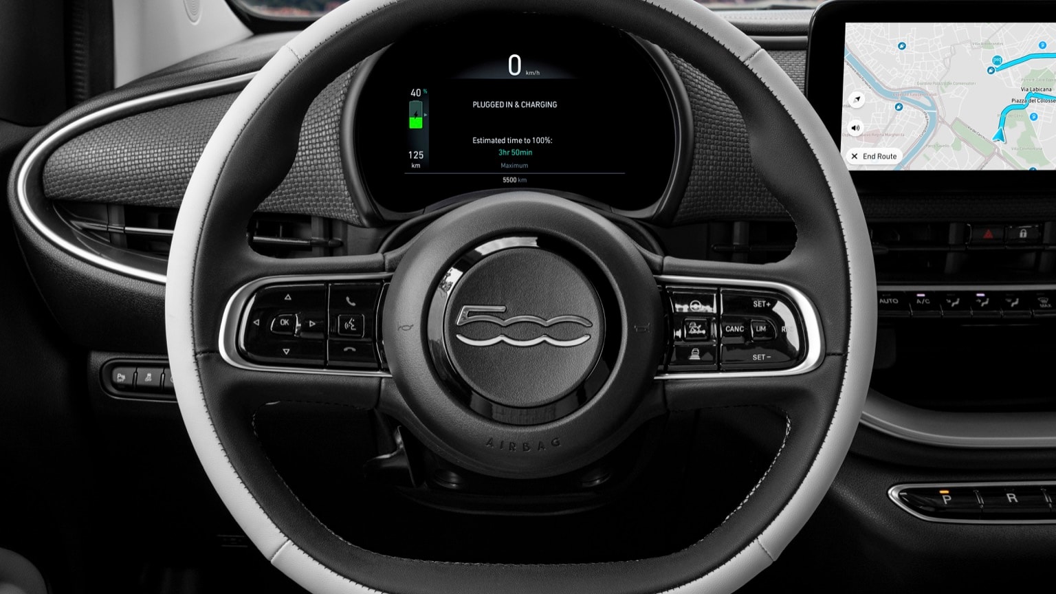 the steering wheel and dashboard of a car