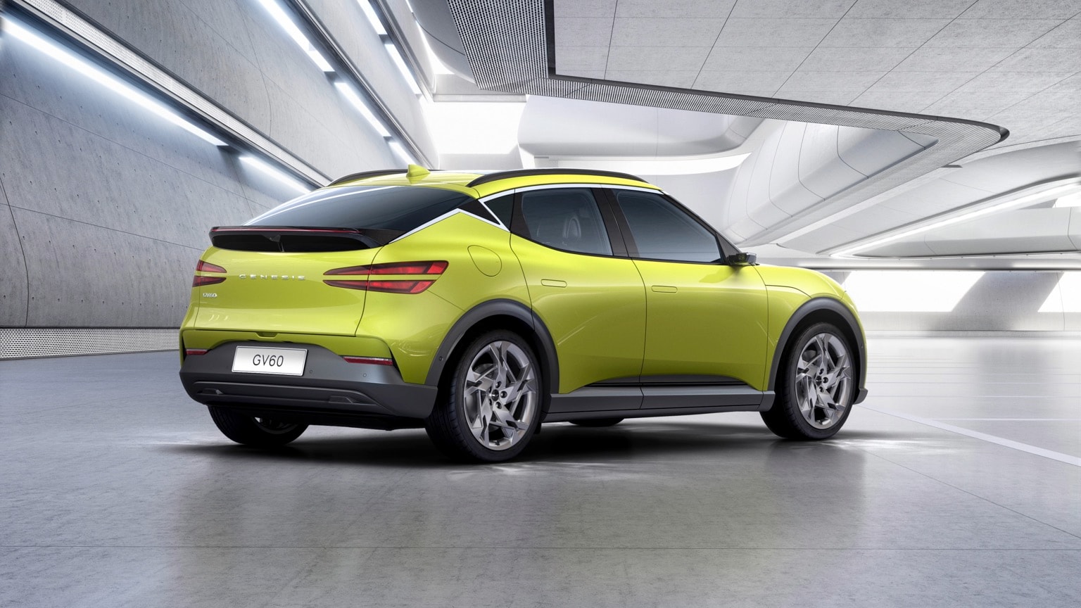 a green car parked in a room
