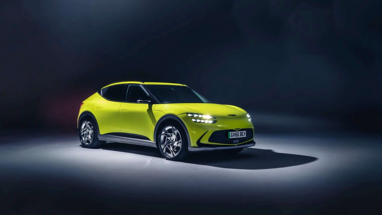 a green car with lights on